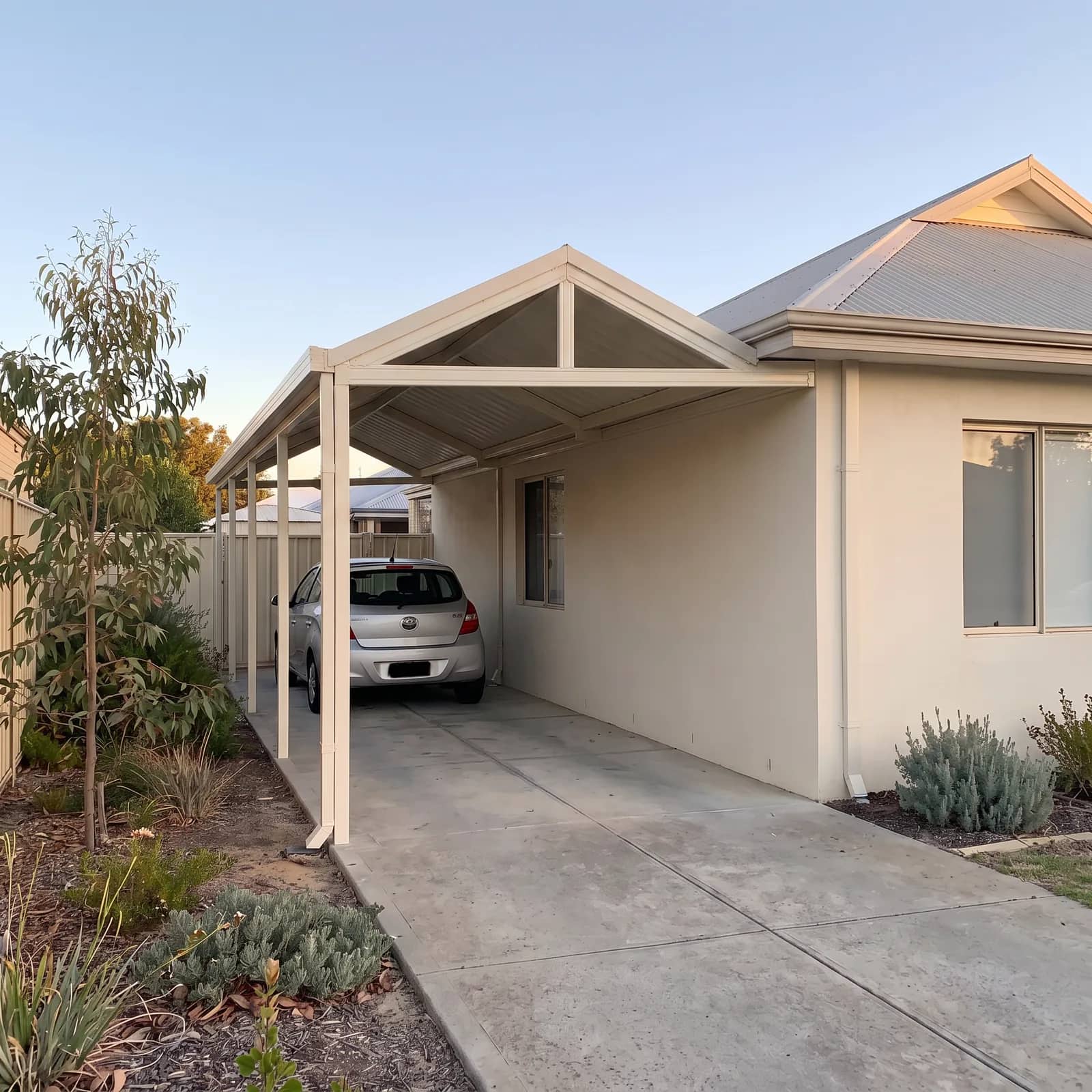 A gable-roof carport with a pitched Colorbond roof