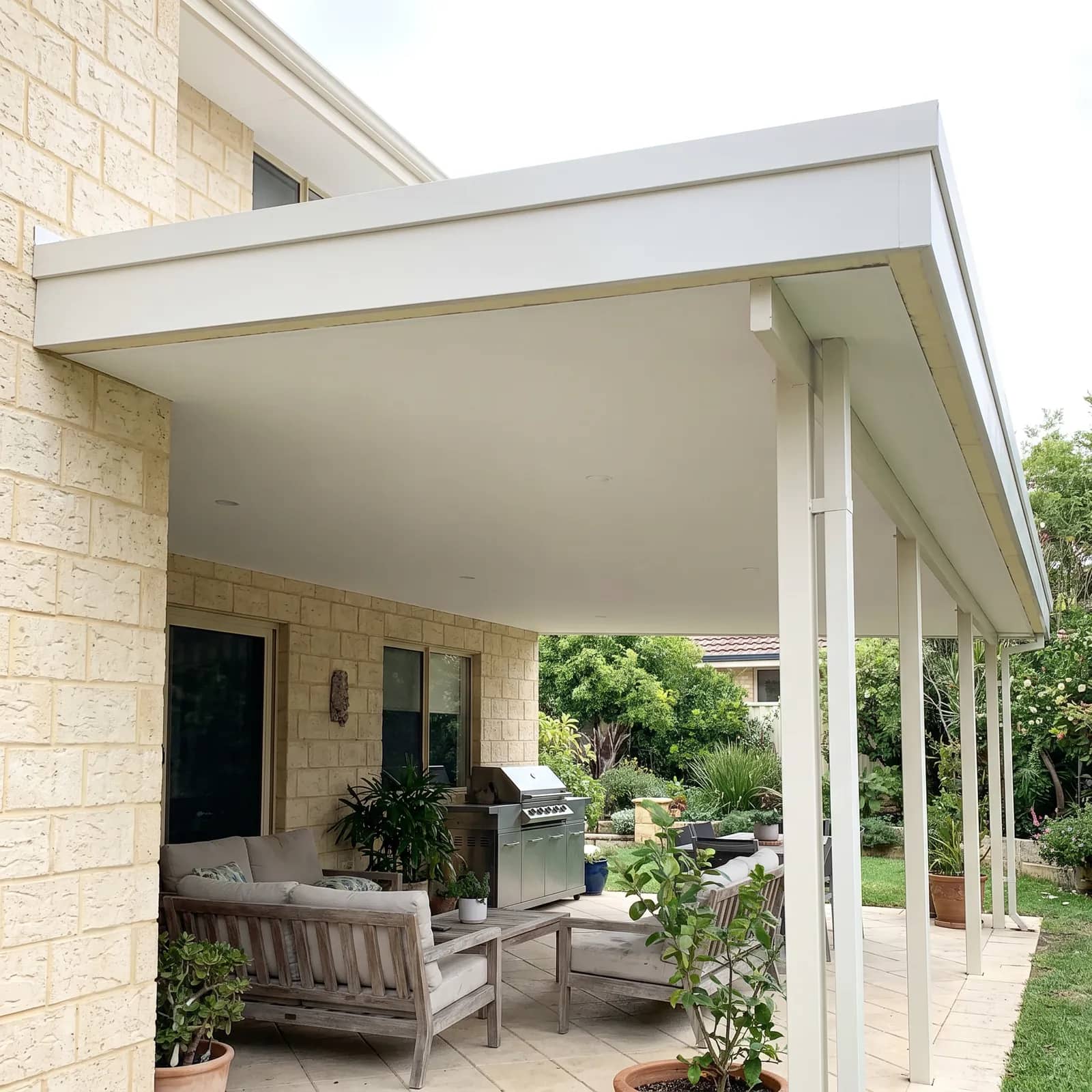 An insulated Colorbond patio roof with a flat white underside at a Perth home