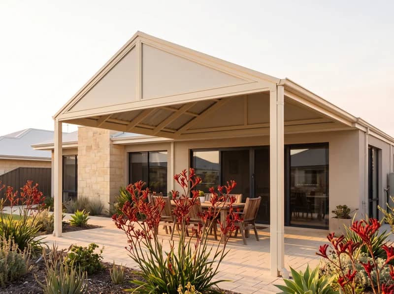 A gable-roof Colorbond patio with an open pitched end at a Perth home